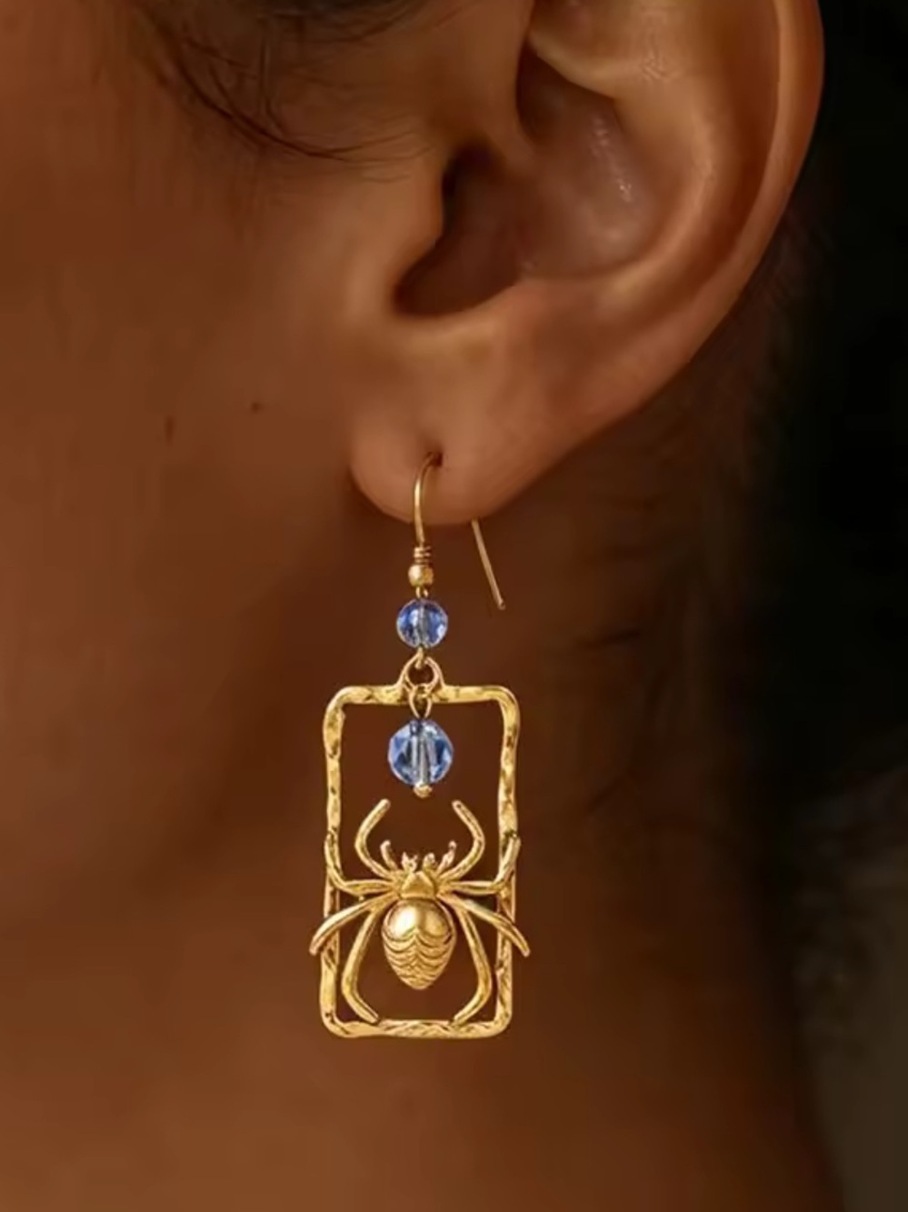 Gold Spider Drop Earrings with Blue Beads